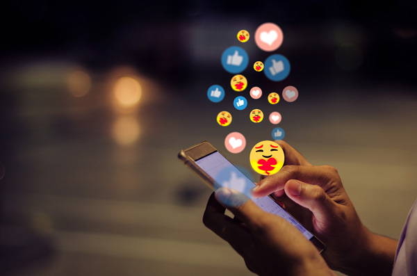 Social-Media-Reactions-Floating-From-A-Smartphone